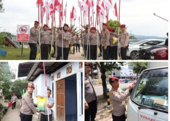 Ditresnarkoba Polda Kepri Bagikan Bendera Merah Putih dan Sembako Kepada Masyarakat Tanjung Uma